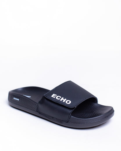 Black slide sandal with 'Echo' branding on a white background