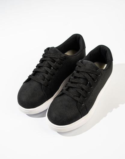 Black sneakers on a white background