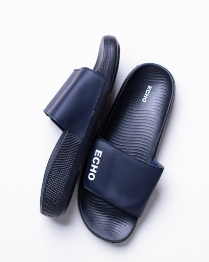 Pair of navy blue slides with 'Echo' branding on a white background