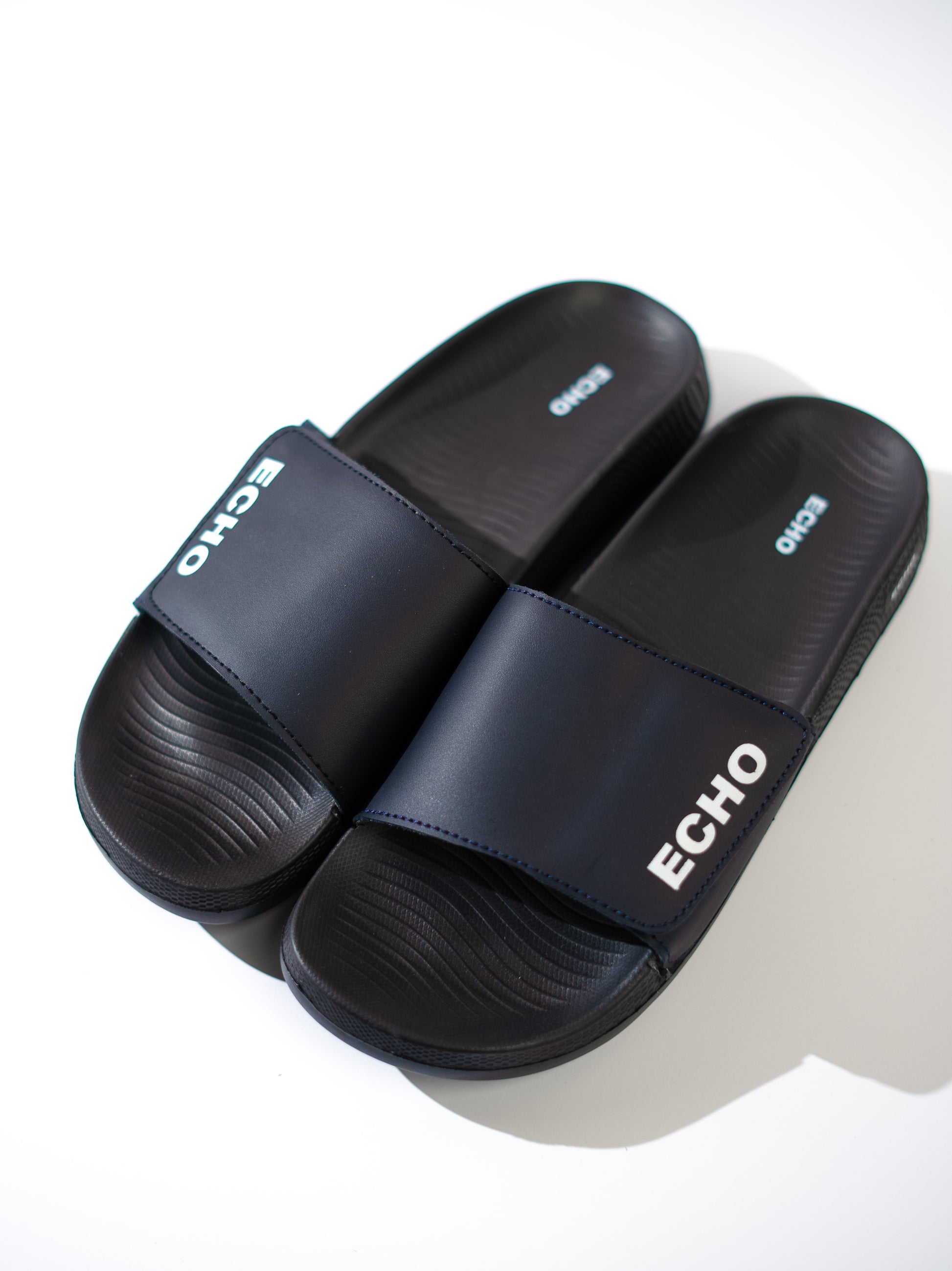 Black slides with 'ECHO' branding on a light gray background
