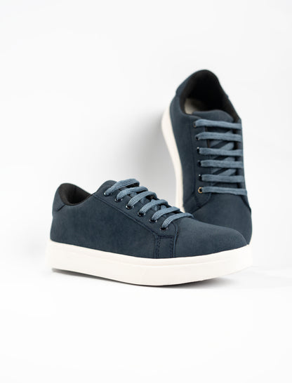 Pair of blue sneakers on a white background