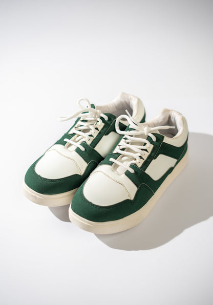 Green and white sneakers on a white background