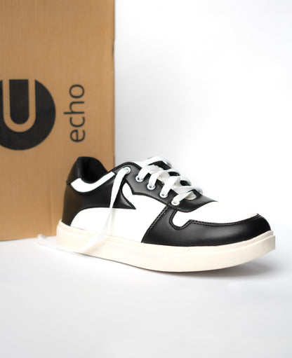 Black and white sneaker with 'echo' box in the background