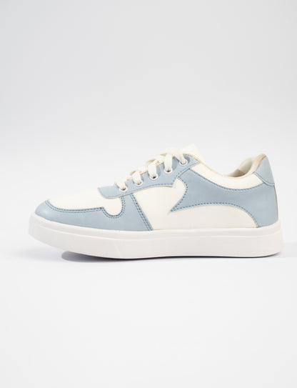 Light blue and white sneaker on a light gray background