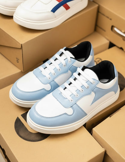 Blue and white sneakers on top of cardboard boxes