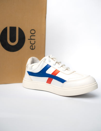 White sneaker with blue and red accents next to a cardboard box with 'echo' branding.