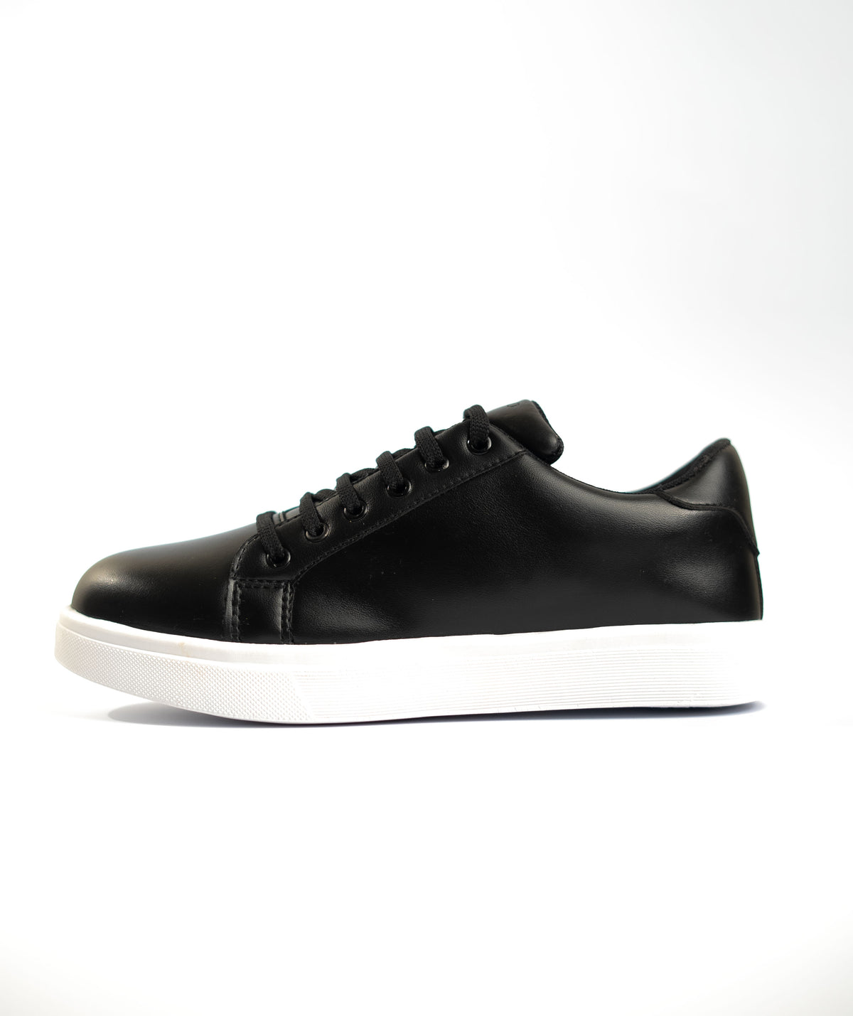 Black leather sneaker on a white background
