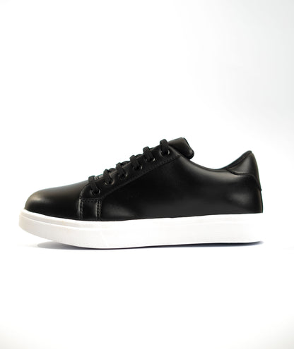 Black leather sneaker on a white background