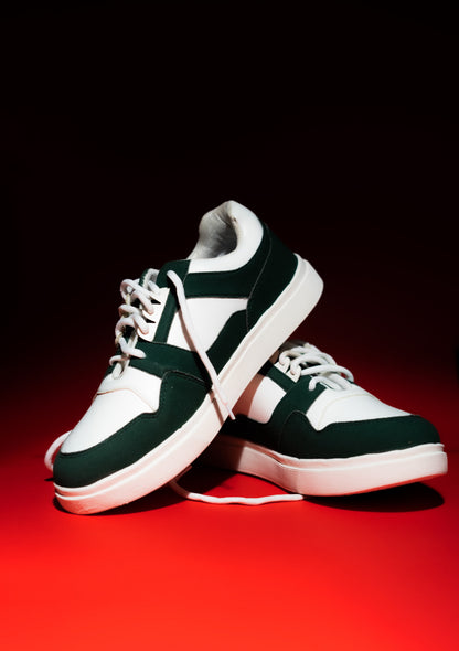 Green and white sneakers on a red and black gradient background